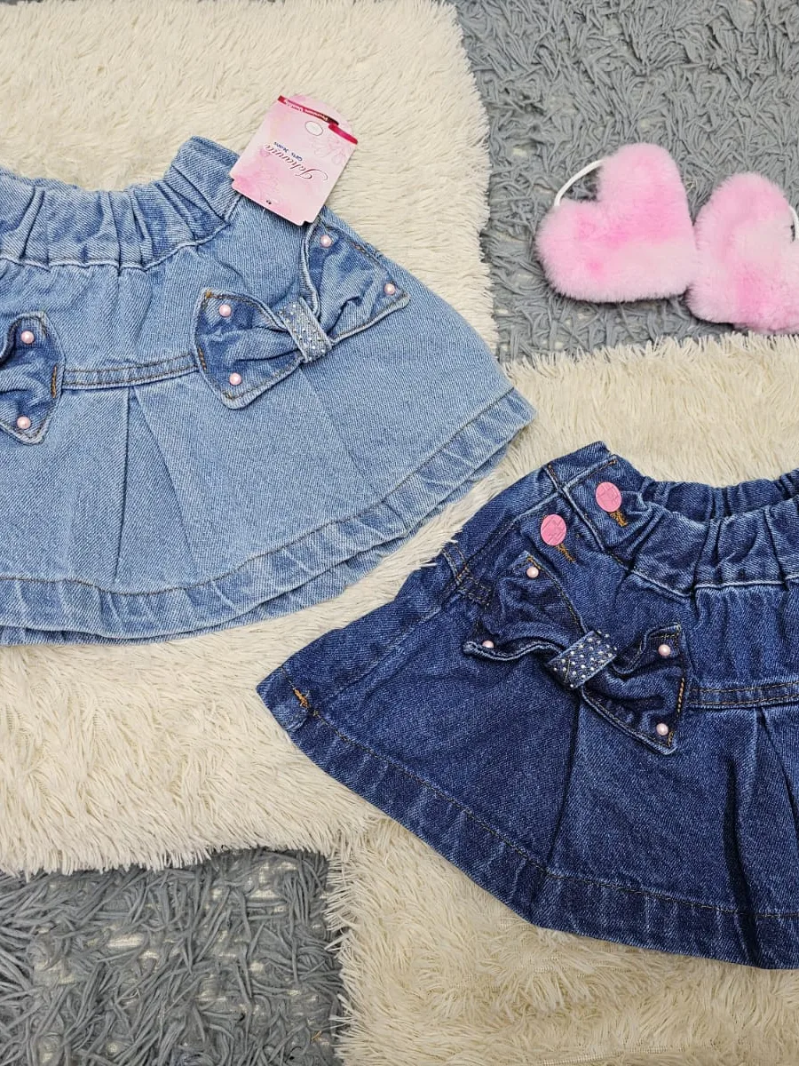 Falda en jean con prenses y moños